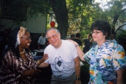 Folabo Ajayi-Soyinka with Paul and Laura Miller at one of Paul's garden parties.