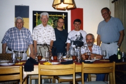 Paul gives a dinner party for John Williams, early 2000s.