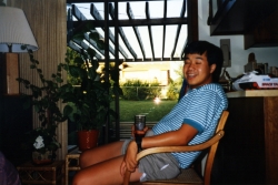 Jun Gonzales in family room of Randall Rd. house, early 1990s.