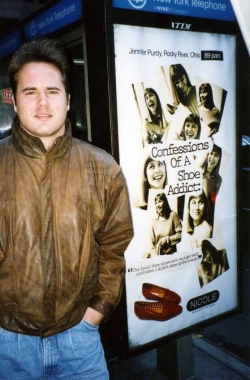 David Scott with street posters in NYC, 1994.