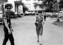 Paul behind the Manila Hotel with Lily Amansec, 1964.