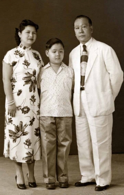 Family photo in studio, early 1950s.