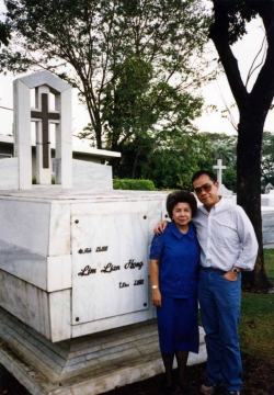 Paul and Mom visit Pop's tomb at Manila Memorial Park, late 1970s.