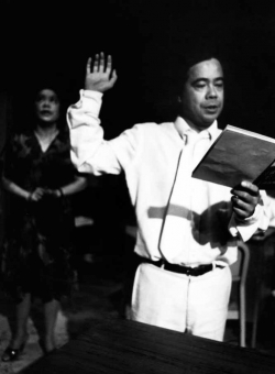 Alberto Isaac in the "swearing in" scene from the play.