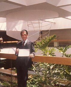 Paul with U.S. certificate of citizenship, 1982.