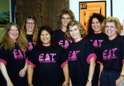 KU English Department secretaries wearing EAT t-shirts, early 1990s.