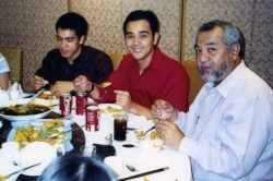 Ray Salvosa and his two sons at dinner party given by Paul, 2005.