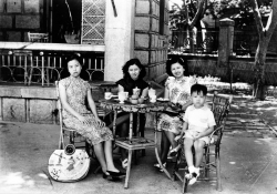 Paul and Mom with Mom's relatives in China, 1948.