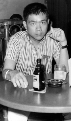 Paul at beer parlor in downtown Manila, mid-1960s.