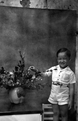 Paul in house in Chinatown in Manila, 1949.
