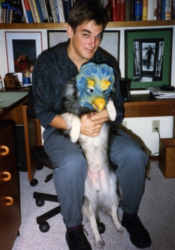 Don Dinwiddie with Imelda in a mask, mid-1980s.