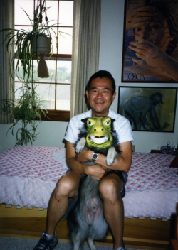 Paul with Imelda in a Halloween mask, mid-1980s.
